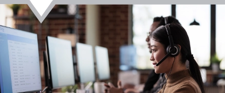 IT support engineer working on the computer offering IT support to clients