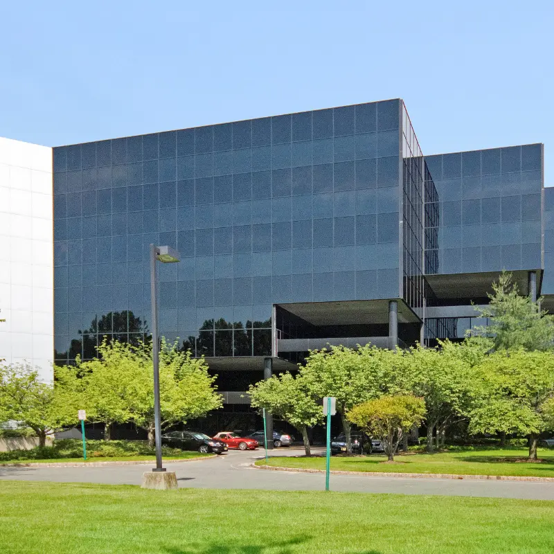 Long shot of the outside view of the Maintech global headquarters